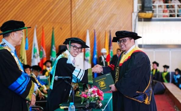 Ketua Bawaslu RI Rahmat Bagja Resmi Sandang Gelar Doktor Hukum dari Universitas Andalas