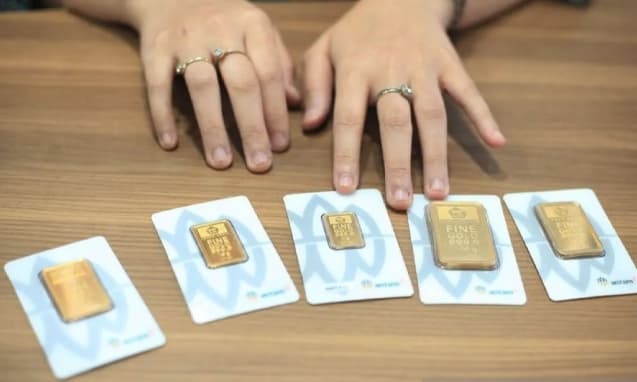 Harga Emas Antam Anjlok Rp35.000 Menjadi Rp2,605 Juta per Gram pada Jumat Pagi