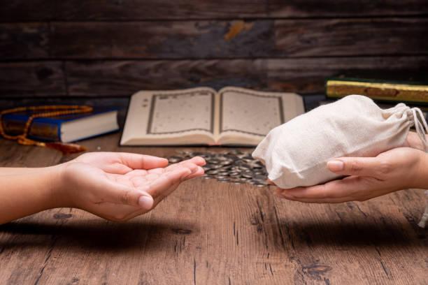 Zakat Fitrah Dibayar Orang Lain, Begini Hukum dan Ketentuannya